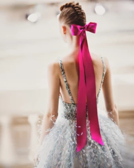 The pink bow from the 2021 Chanel Haute Couture Show at Palais Galiera Paris — Photo Mathieu Bonnin 